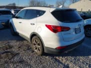 ✅ 2014 Hyundai Santa Fe • VIN: 5XYZUDLB8EG223579 • Lot: 43887430. Listed on IAAI with 181,075 mi. Free auction sales archive from the USA and detailed vehicle history report at DreamBid. Image 3.