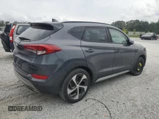 ✅ 2018 Hyundai Tucson Value • VIN: KM8J33A27JU804556 • Лот: 84006025. Опубликован ранее на Copart с пробегом 90 520 миль. Бесплатный доступ к архиву аукционных продаж из США и подробный отчёт об истории автомобиля на DreamBid. Изображение 3.