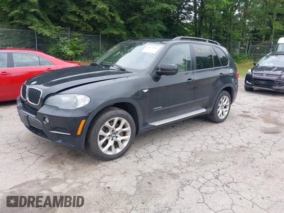 ✅ 2011 BMW X5 35i • VIN: 5UXZV4C57BL740975 • Lot: 42672015. Listed on IAAI with 165,816 mi. Free auction sales archive from the USA and detailed vehicle history report at DreamBid. Image 2.