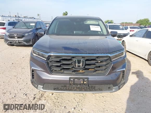 ✅ 2023 Honda Pilot EX-L • VIN: 5FNYG2H42PB013216 • Lot: 41938099. Wystawiony na IAAI z przebiegiem 22 838 mil. Bezpłatny archiwum sprzedaży aukcyjnych z USA i szczegółowy raport historii pojazdu na DreamBid. Zdjęcie 6.