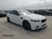 ✅ 2016 BMW M5 • VIN: WBSFV9C59GD595692 • Lot: 74151434. Wystawiony na Copart z przebiegiem 55 092 mil. Bezpłatny archiwum sprzedaży aukcyjnych z USA i szczegółowy raport historii pojazdu na DreamBid. Zdjęcie 4.