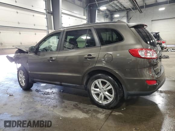 ✅ 2012 Hyundai Santa Fe SE • VIN: 5XYZH4AG4CG157273 • Lot: 72209534. Listed on Copart with 114,915 mi. Free auction sales archive from the USA and detailed vehicle history report at DreamBid. Image 2.
