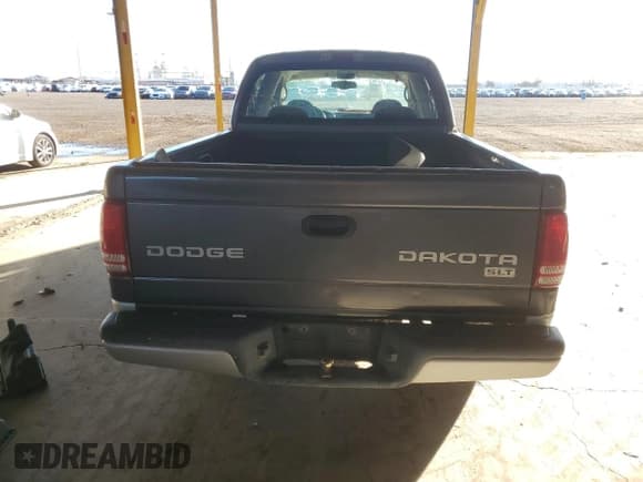 ✅ 2003 Dodge Dakota SLT • VIN: 1D7HL48NX3S135602 • Lot: 79321584. Wystawiony na Copart z przebiegiem Nie podano. Bezpłatny archiwum sprzedaży aukcyjnych z USA i szczegółowy raport historii pojazdu na DreamBid. Zdjęcie 6.