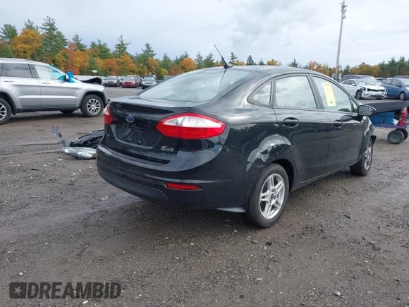 ✅ 2018 Ford Fiesta SE • VIN: 3FADP4BJ5JM119788 • Lot: 43450934. Listed on IAAI with 64,139 mi. Free auction sales archive from the USA and detailed vehicle history report at DreamBid. Image 4.
