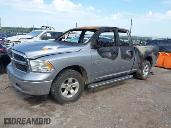 2021 Ram 1500 Tradesman z VIN 1C6RR6FG8MS525121, wystawiony jako IAAI lot #42886475 z przebiegiem Nie podano mil oraz . Historia ofert i sprzedaży dostępna na DreamBid. Obrazek 2.