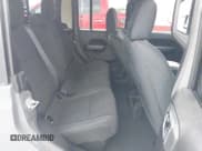 ✅ 2021 Jeep Gladiator Sport S • VIN: 1C6HJTAG5ML570892 • Lot: 42125056. Wystawiony na IAAI z przebiegiem 83 623 mil. Bezpłatny archiwum sprzedaży aukcyjnych z USA i szczegółowy raport historii pojazdu na DreamBid. Zdjęcie 8.