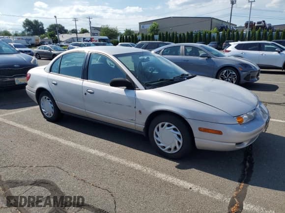 ✅ 2000 Saturn SL • VIN: 1G8ZK5279YZ252761 • Lot: 63204475. Listed on Copart with 80,646 mi. Free auction sales archive from the USA and detailed vehicle history report at DreamBid. Image 4.