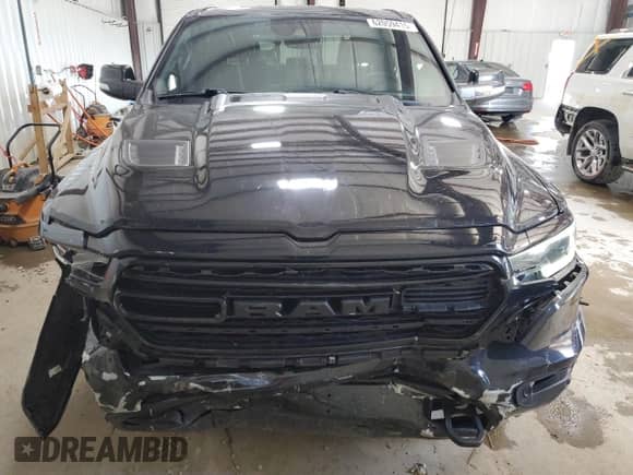2021 Ram 1500 Limited with VIN 1C6SRFHT0MN627698, listed as a Copart auction lot 62059415 with 76,140 mi miles and Salvage title. Bid and sale history available at DreamBid. Image 5.