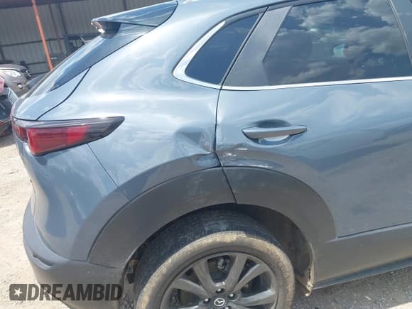 ✅ 2023 Mazda CX-30 S Preferred • VIN: 3MVDMBCM1PM531097 • Lot: 42584635. Listed on IAAI with 56,161 mi. Free auction sales archive from the USA and detailed vehicle history report at DreamBid. Image 18.