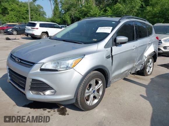 ✅ 2013 Ford Escape SE • VIN: 1FMCU0GX3DUC23910 • Lot: 42245926. Listed on IAAI with 159,076 mi. Free auction sales archive from the USA and detailed vehicle history report at DreamBid. Image 18.