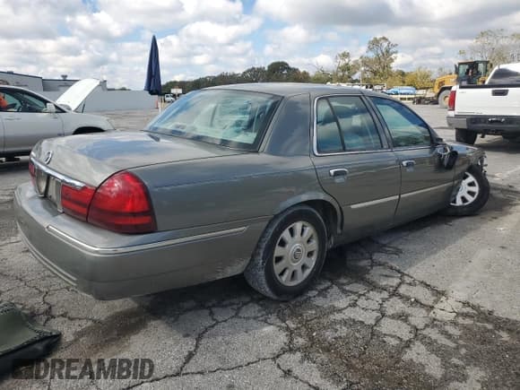 ✅ 2003 Mercury Grand Marquis LS Premium • VIN: 2MEFM75W73X699958 • Lot: 90725825. Listed on Copart with 89,520 mi. Free auction sales archive from the USA and detailed vehicle history report at DreamBid. Image 3.