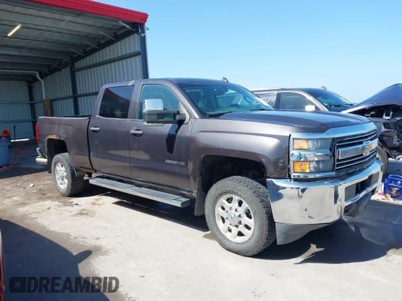 ✅ 2015 Chevrolet Silverado 2500HD LT • VIN: 1GC1KVE8XFF117049 • Lot: 42800240. Listed on IAAI with 375,598 mi. Free auction sales archive from the USA and detailed vehicle history report at DreamBid. Image 1.