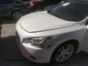 ✅ 2014 Nissan Maxima SV • VIN: 1N4AA5APXEC482563 • Lot: 34583717. Listed on IAAI with 140,760 mi. Free auction sales archive from the USA and detailed vehicle history report at DreamBid. Image 6.