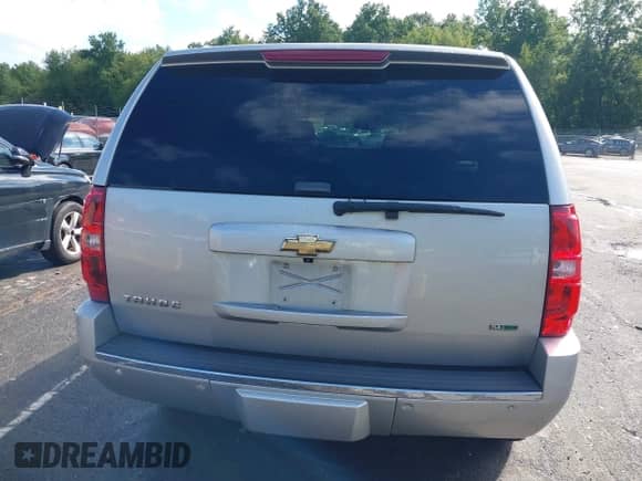 2011 Chevrolet Tahoe LTZ with VIN 1GNSKCE01BR231833, listed as a IAAI auction lot 43053303 with 247,341 mi miles and . Bid and sale history available at DreamBid. Image 16.