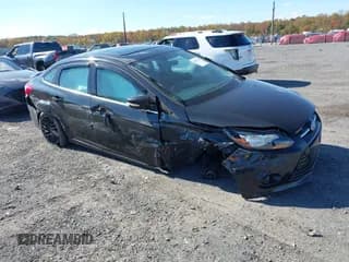 ✅ 2014 Ford Focus Titanium • VIN: 1FADP3J2XEL212933 • Lot: 43513719. Listed on IAAI with Not provided. Free auction sales archive from the USA and detailed vehicle history report at DreamBid. Image 1.
