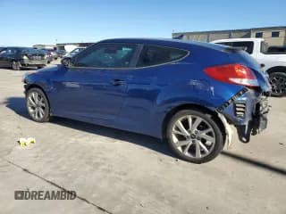 ✅ 2016 Hyundai Veloster • VIN: KMHTC6AD5GU257761 • Lot: 84443674. Listed on Copart with 80,007 mi. Free auction sales archive from the USA and detailed vehicle history report at DreamBid. Image 2.