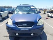 ✅ 2008 Kia Rondo LX • VIN: KNAFG526587146396 • Lot: 42370462. Wystawiony na IAAI z przebiegiem 195 496 mil. Bezpłatny archiwum sprzedaży aukcyjnych z USA i szczegółowy raport historii pojazdu na DreamBid. Zdjęcie 12.