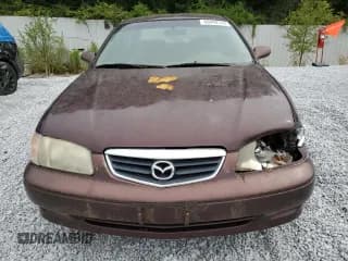 ✅ 2000 Mazda 626 LX • VIN: 1YVGF22D8Y5126950 • Lot: 69440124. Wystawiony na Copart z przebiegiem 208 584 mil. Bezpłatny archiwum sprzedaży aukcyjnych z USA i szczegółowy raport historii pojazdu na DreamBid. Zdjęcie 5.