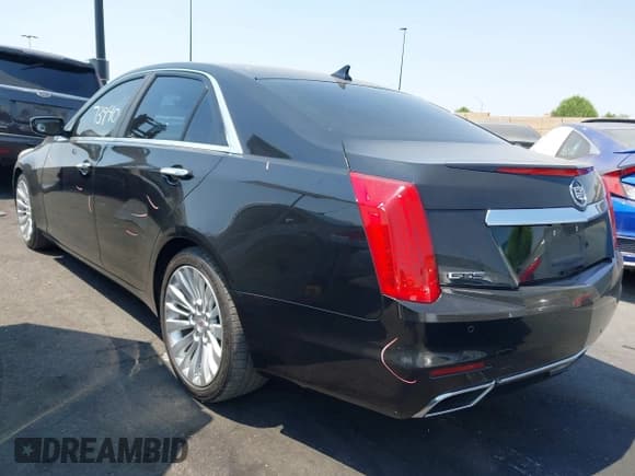 ✅ 2014 Cadillac CTS Performance RWD • VIN: 1G6AS5S34E0169869 • Лот: 42973940. Опубликован ранее на IAAI с пробегом 130 000 миль. Бесплатный доступ к архиву аукционных продаж из США и подробный отчёт об истории автомобиля на DreamBid. Изображение 3.