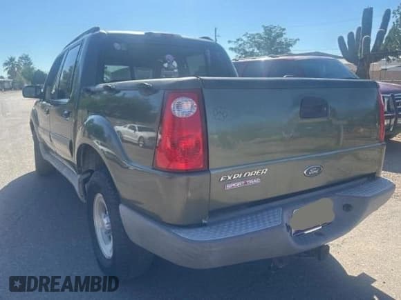 ✅ 2003 Ford Explorer Sport Trac XLS • VIN: 1FMZU67E43UA32975 • Lot: 83975705. Wystawiony na Copart z przebiegiem 212 492 mil. Bezpłatny archiwum sprzedaży aukcyjnych z USA i szczegółowy raport historii pojazdu na DreamBid. Zdjęcie 3.