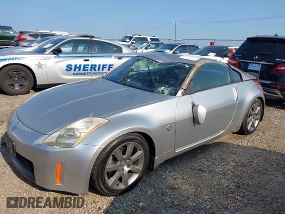 ✅ 2003 Nissan 350Z Touring • VIN: JN1AZ34D43T103694 • Lot: 42602625. Wystawiony na IAAI z przebiegiem 271 699 mil. Bezpłatny archiwum sprzedaży aukcyjnych z USA i szczegółowy raport historii pojazdu na DreamBid. Zdjęcie 2.