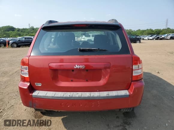 ✅ 2010 Jeep Compass Sport • VIN: 1J4NT4FB0AD560523 • Лот: 60114385. Опубликован ранее на Copart с пробегом 123 557 миль. Бесплатный доступ к архиву аукционных продаж из США и подробный отчёт об истории автомобиля на DreamBid. Изображение 6.