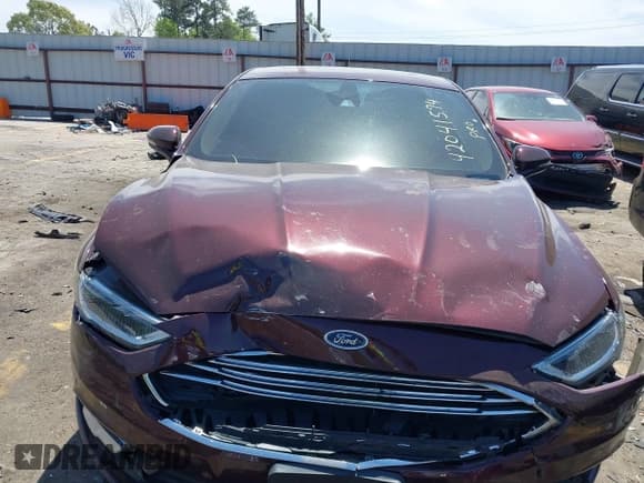 ✅ 2017 Ford Fusion Hybrid Titanium • VIN: 3FA6P0RU8HR321040 • Lot: 42041574. Listed on IAAI with 106,525 mi. Free auction sales archive from the USA and detailed vehicle history report at DreamBid. Image 12.