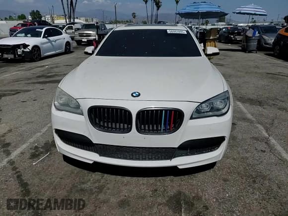 ✅ 2013 BMW 7 Series 750i • VIN: WBAYA8C54DC996412 • Lot: 56982895. Listed on Copart with 124,258 mi. Free auction sales archive from the USA and detailed vehicle history report at DreamBid. Image 13.