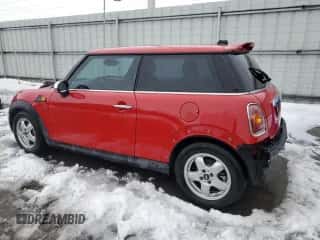 2009 MINI Hardtop with VIN WMWMF33559TU70753, listed as a Copart auction lot 79898174 with 63,051 mi miles and Salvage title. Bid and sale history available at DreamBid. Image 2.