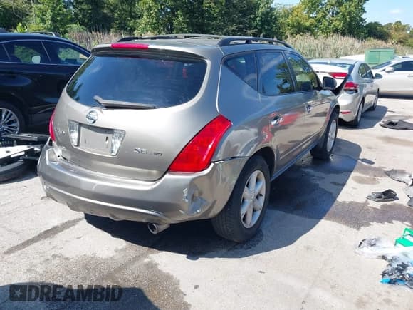 ✅ 2004 Nissan Murano SE • VIN: JN8AZ08W24W335285 • Lot: 43311141. Wystawiony na IAAI z przebiegiem 128 597 mil. Bezpłatny archiwum sprzedaży aukcyjnych z USA i szczegółowy raport historii pojazdu na DreamBid. Zdjęcie 4.