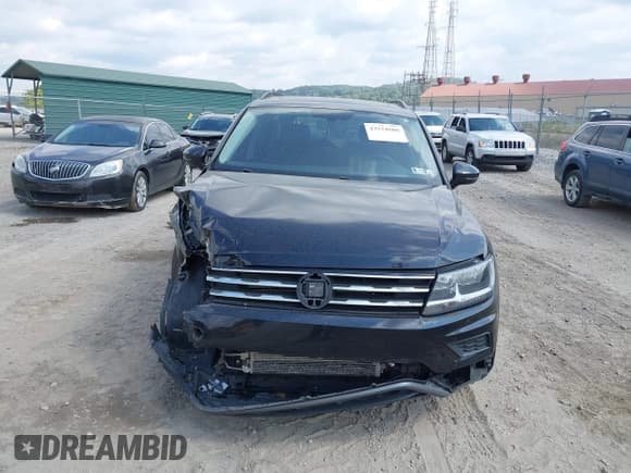 ✅ 2021 Volkswagen Tiguan SE • VIN: 3VV2B7AX6MM031264 • Лот: 43224608. Опубликован ранее на IAAI с пробегом 61 896 миль. Бесплатный доступ к архиву аукционных продаж из США и подробный отчёт об истории автомобиля на DreamBid. Изображение 13.