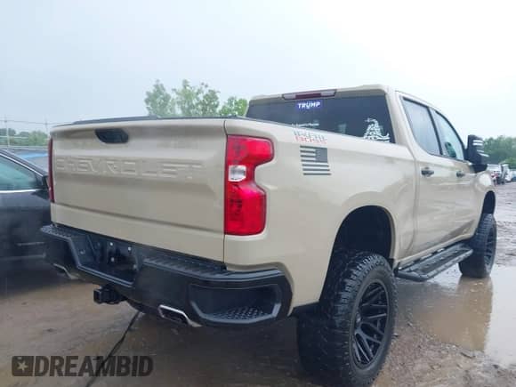 2022 Chevrolet Silverado 1500 Custom Trail Boss with VIN 3GCPDCED5NG679881, listed as a IAAI auction lot 42430820 with 30,910 mi miles and . Bid and sale history available at DreamBid. Image 4.