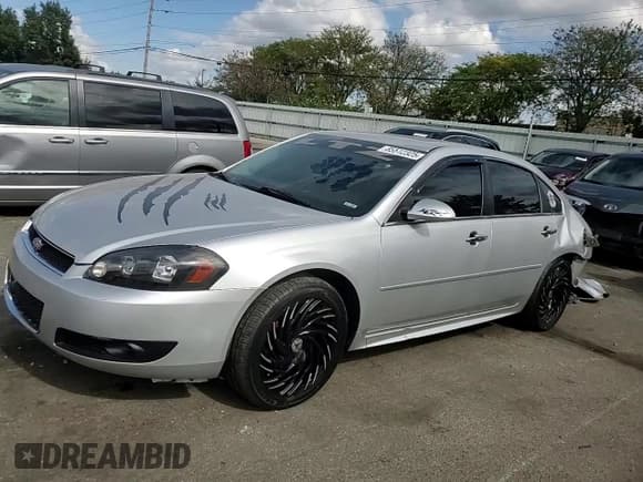 ✅ 2014 Chevrolet Impala LTZ • VIN: 2G1WC5E37E1131500 • Lot: 85512325. Listed on Copart with 165,352 mi. Free auction sales archive from the USA and detailed vehicle history report at DreamBid. Image 13.