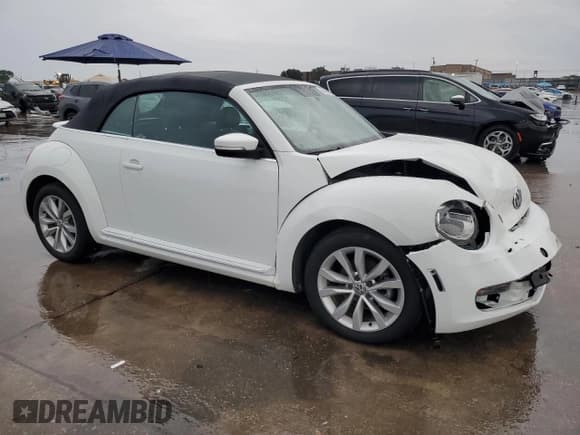 ✅ 2014 Volkswagen Beetle 2.0L TDI • VIN: 3VW5L7AT9EM823171 • Lot: 69486244. Listed on Copart with 65,557 mi. Free auction sales archive from the USA and detailed vehicle history report at DreamBid. Image 4.