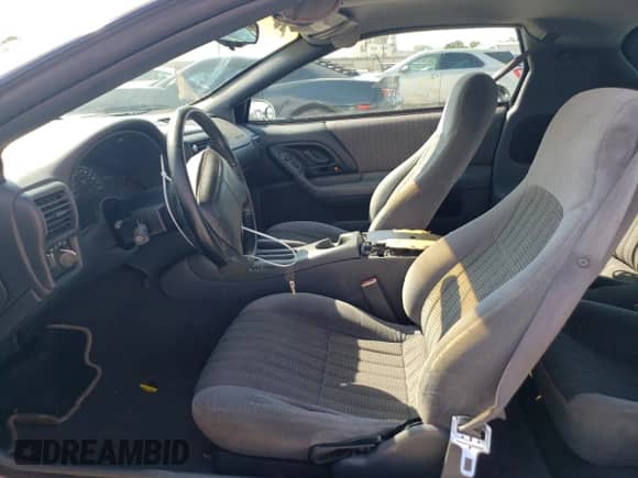 1999 Chevrolet Camaro z VIN 2G1FP22K0X2108362, wystawiony jako Copart lot #69871065 z przebiegiem 117 855 mil mil oraz Czysty tytuł • Clean title. Historia ofert i sprzedaży dostępna na DreamBid. Obrazek 7.