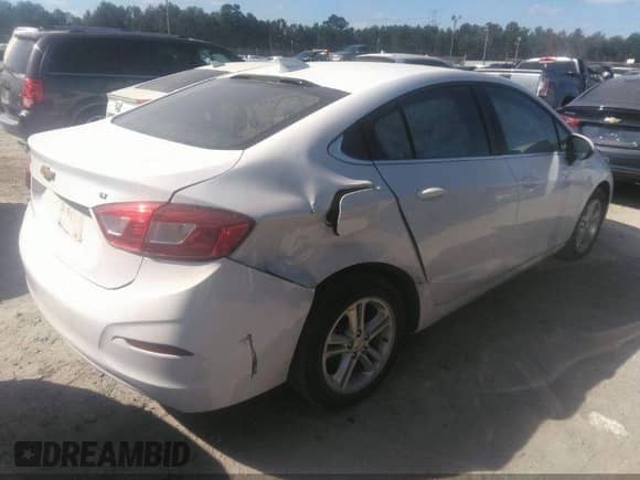 2018 Chevrolet Cruze LT with VIN 1G1BE5SM2J7169543, listed as a IAAI auction lot 42137082 with 84,525 mi miles and . Bid and sale history available at DreamBid. Image 4.