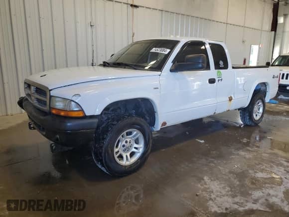 2004 Dodge Dakota Sport с VIN 1D7HG32N34S739646, выставлен на аукционе Copart как лот 74523084 с пробегом 277 000 миль миль и На запчасти • Non repairable. История ставок и продаж доступна на DreamBid. Изображение 1.