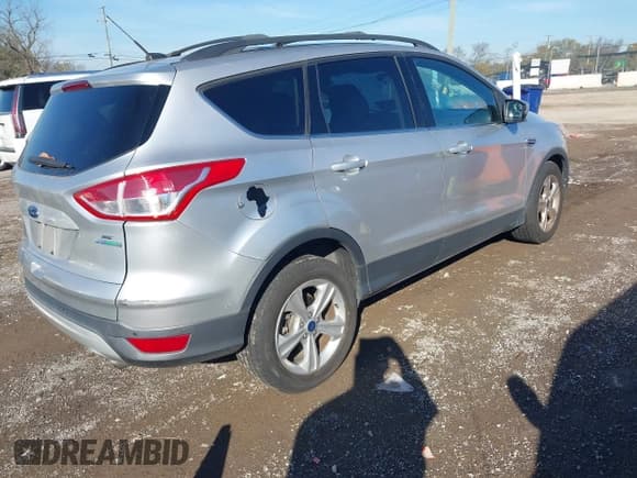 ✅ 2015 Ford Escape SE • VIN: 1FMCU0GX0FUC10860 • Lot: 43601320. Listed on IAAI with 169,944 mi. Free auction sales archive from the USA and detailed vehicle history report at DreamBid. Image 4.