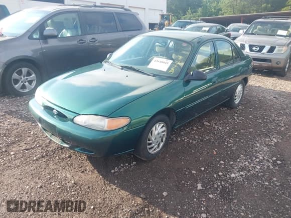✅ 1999 Ford Escort SE • VIN: 1FAFP13P2XW264113 • Lot: 42648045. Listed on IAAI with 72,253 mi. Free auction sales archive from the USA and detailed vehicle history report at DreamBid. Image 2.