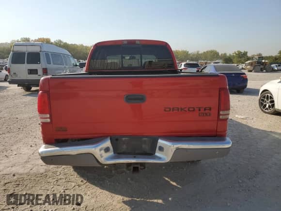 2004 Dodge Dakota SLT z VIN 1D7HG48N04S627240, wystawiony jako Copart lot #75443294 z przebiegiem 151 334 mil mil oraz Szkoda całkowita • Salvage title. Historia ofert i sprzedaży dostępna na DreamBid. Obrazek 6.