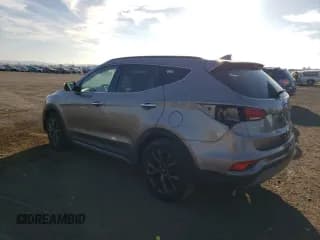 ✅ 2018 Hyundai Santa Fe Ultimate • VIN: 5XYZW4LA9JG566204 • Лот: 71269233. Опубликован ранее на Copart с пробегом 86 616 миль. Бесплатный доступ к архиву аукционных продаж из США и подробный отчёт об истории автомобиля на DreamBid. Изображение 2.