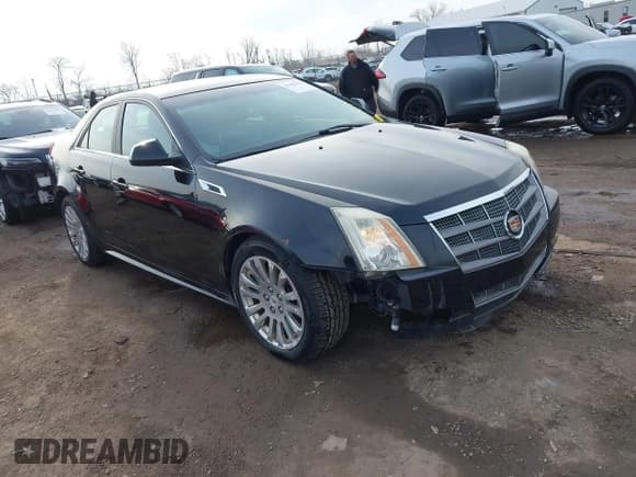 ✅ 2011 Cadillac CTS Premium • VIN: 1G6DS5ED7B0101210 • Lot: 41802027. Listed on IAAI with 127,701 mi. Free auction sales archive from the USA and detailed vehicle history report at DreamBid. Image 1.