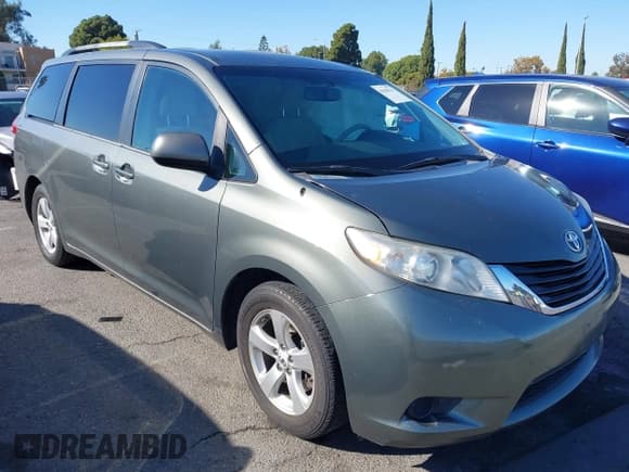 ✅ 2014 Toyota Sienna LE • VIN: 5TDKK3DC5ES458775 • Lot: 43588211. Listed on IAAI with 72,262 mi. Free auction sales archive from the USA and detailed vehicle history report at DreamBid. Image 1.