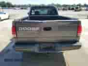 2002 Dodge Dakota Sport z VIN 1B7GL32XX2S588725, wystawiony jako Copart lot #65541345 z przebiegiem 205 568 mil mil oraz Szkoda całkowita • Salvage title. Historia ofert i sprzedaży dostępna na DreamBid. Obrazek 6.