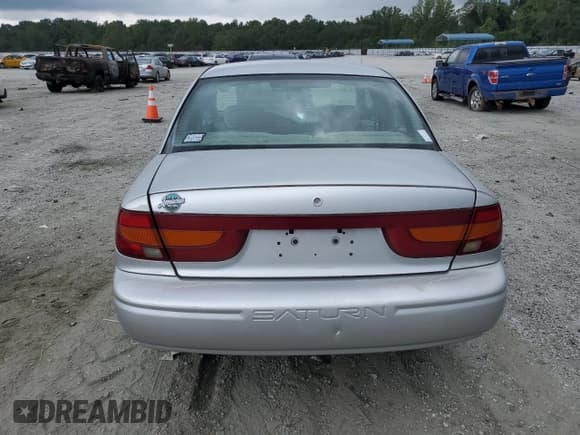 ✅ 2002 Saturn SL • VIN: 1G8ZK52702Z264191 • Лот: 70042825. Опубликован ранее на Copart с пробегом 118 826 миль. Бесплатный доступ к архиву аукционных продаж из США и подробный отчёт об истории автомобиля на DreamBid. Изображение 6.