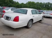 ✅ 1998 Lincoln Town Car Signature • VIN: 1LNFM82W5WY678263 • Lot: 42884109. Listed on IAAI with 128,024 mi. Free auction sales archive from the USA and detailed vehicle history report at DreamBid. Image 4.