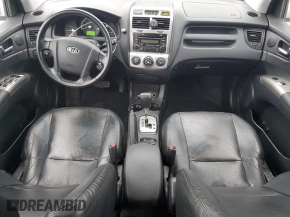 ✅ 2008 Kia Sportage LX • VIN: KNDJE723987454501 • Лот: 93123695. Опубликован ранее на Copart с пробегом 199 163 миль. Бесплатный доступ к архиву аукционных продаж из США и подробный отчёт об истории автомобиля на DreamBid. Изображение 8.