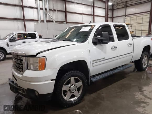 ✅ 2013 GMC Sierra 2500HD Denali • VIN: 1GT125E87DF166982 • Lot: 41414906. Listed on IAAI with 293,947 mi. Free auction sales archive from the USA and detailed vehicle history report at DreamBid. Image 17.