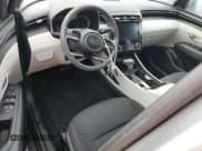 ✅ 2022 Hyundai Tucson SEL • VIN: 5NMJB3AE5NH143575 • Lot: 76587554. Wystawiony na Copart z przebiegiem 14 103 mil. Bezpłatny archiwum sprzedaży aukcyjnych z USA i szczegółowy raport historii pojazdu na DreamBid. Zdjęcie 8.