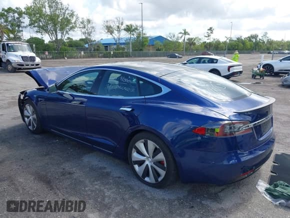 ✅ 2021 Tesla Model S Performance • VIN: 5YJSA1E43MF424593 • Lot: 42198084. Listed on IAAI with 74,546 mi. Free auction sales archive from the USA and detailed vehicle history report at DreamBid. Image 3.